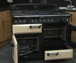 Image of Rangemaster Classic Deluxe CDL110DFFBL/C 110cm Dual Fuel Range Cooker - Black / Chrome - A/A Rated